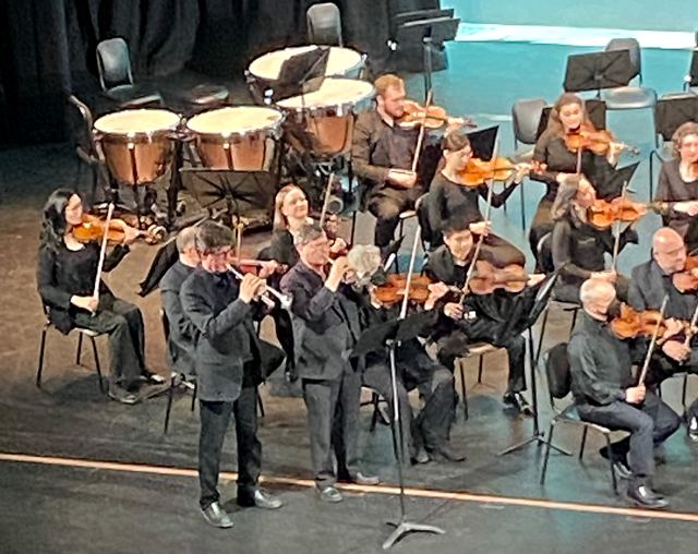 Two trumpet soloists in front of the Lancaster Symphony Orchestra
