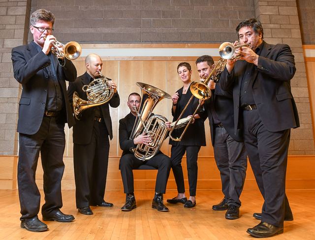 The Towson University Faculty Brass Quintet performing on stage