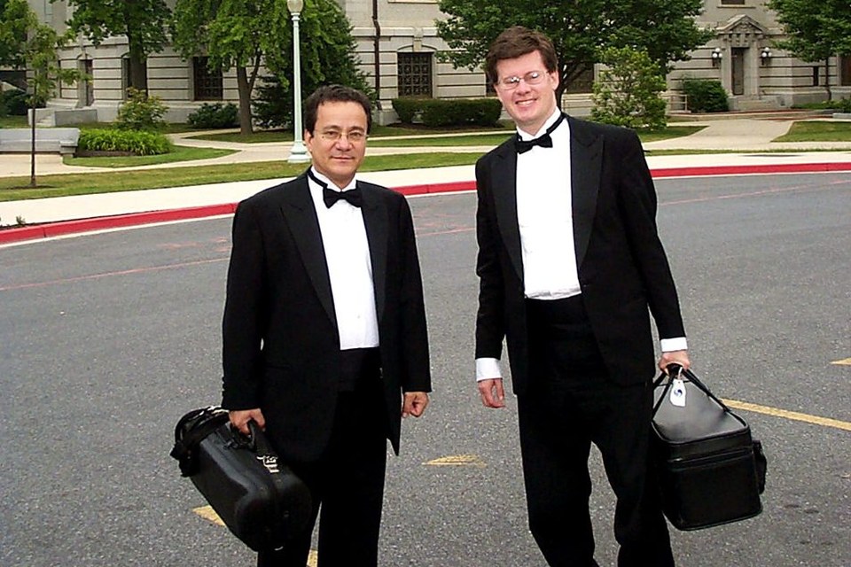 Luis Engelke and a colleague in concert dress at the United States Naval Academy