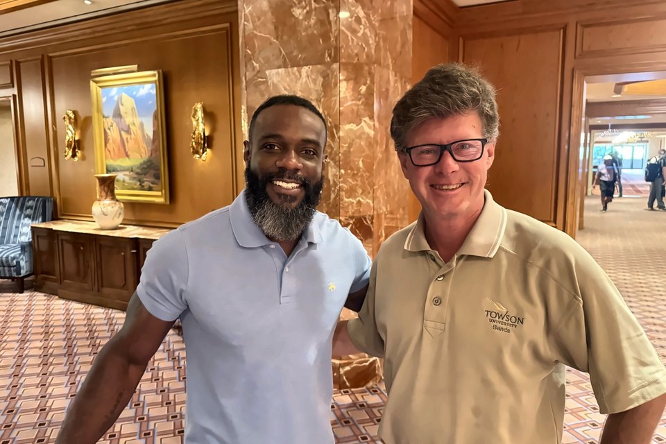 Luis Engelke with composer Omar Thomas in a hotel lobby